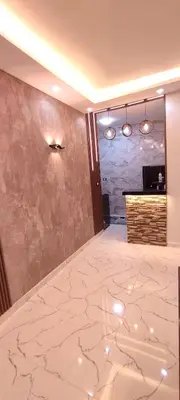 a room with a marble floor and a counter at شقه للايجار اليومى او الشهرىApartment for daily or monthly rent in Hurghada
