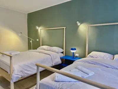 a hospital room with three beds and a blue table at Modern 2BR Villa With Private Pool In Bali In ElGouna in Hurghada