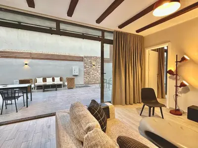 a living room with a couch and a table at Modern 2BR Villa With Private Pool In Bali In ElGouna in Hurghada