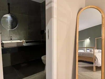 a bathroom with a sink and a mirror at Modern 2BR Villa With Private Pool In Bali In ElGouna in Hurghada