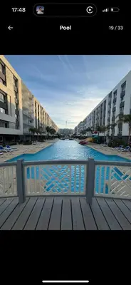 a screenshot of a photo of a river with buildings at Luxus Apartment in Hurghada