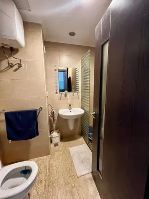 a bathroom with a toilet and a sink at Luxury Studio in Aldau Heights Hurghada in Hurghada