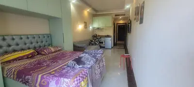 a small room with a bed and a kitchen at Beachfront Resort Seaview Haven Modern Near Airport in Hurghada