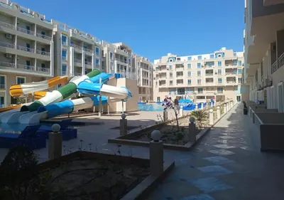a water slide in the middle of a playground at -Hurghada HUB Resort-Peaceful Getaway in Hurghada