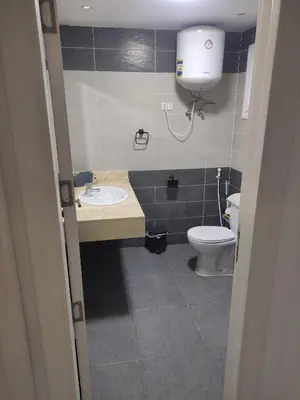 a bathroom with a sink and a toilet at Hurghada Fanader bay in Hurghada