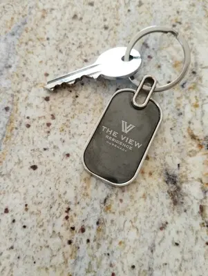 a key chain on a counter with a key chain at The View Island in Hurghada