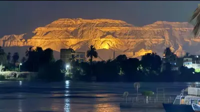 a view of a mountain at night at El Bawaba Lodge & Luxury Retreat in Al Aqālitah