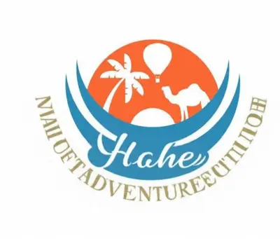 a logo for a hawaiian island with a hot air balloon at valleyofthenileadventures in Luxor