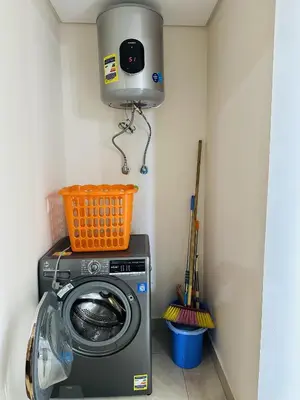 a washing machine with a basket on top of it at Beautiful Island View in Hurghada