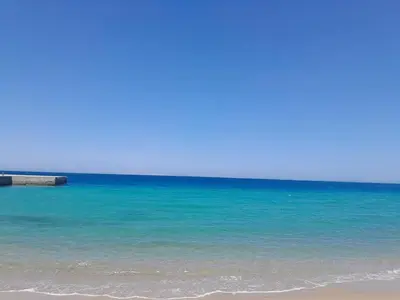 a view of the ocean with a sandy beach at Stylish studio with sea view in Hurghada