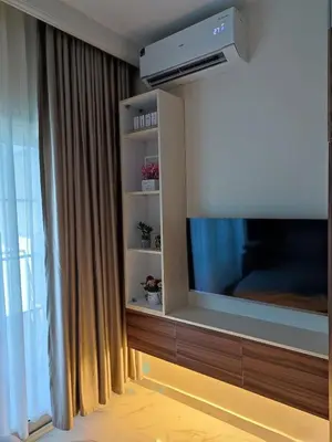 a living room with a large flat screen tv at Perfect studio for holiday in Hurghada