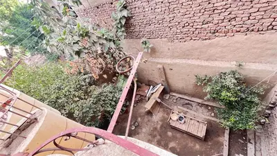 an overhead view of a brick building with plants at Family Flat With Breakfast in Luxor
