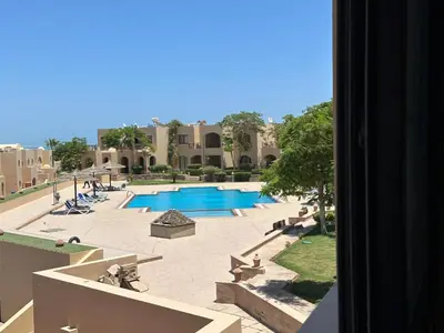 a view of a swimming pool from a building at The Nubian Seabreeze in Hurghada