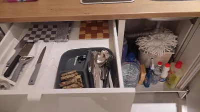 a toy kitchen with a sink and utensils at Hurghada Concierge at Fiesta Beach Resort 411 in Hurghada