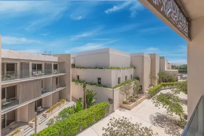 an aerial view of a building with plants at Cozy One Bedroom in Mangroovy in Hurghada