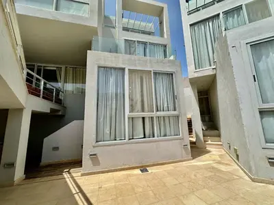 a building with a window in the middle of it at Cozy 2 bedroom Sholan 1 - Gouna in Hurghada