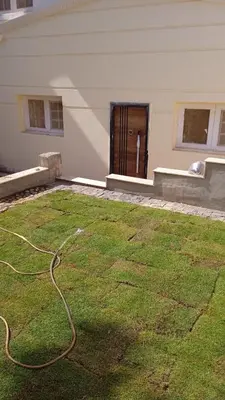 a yard with a hose in front of a building at فيلا للإيجار فى مجاويش الغردقة in Hurghada