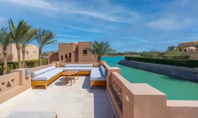 a view of the pool from the balcony of a villa at Luxury Stays in West Golf El Gouna in Hurghada