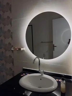 a bathroom with a sink and a mirror at Villa Kayan in Luxor