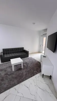 a living room with a couch and a table at Stunning sea view Apartment in Hurghada