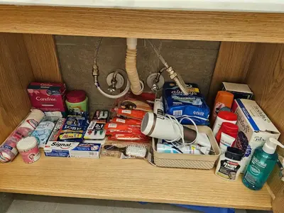 a cabinet filled with lots of food and other items at Private Garden Studio Wi-Fi and Beach Access in Hurghada