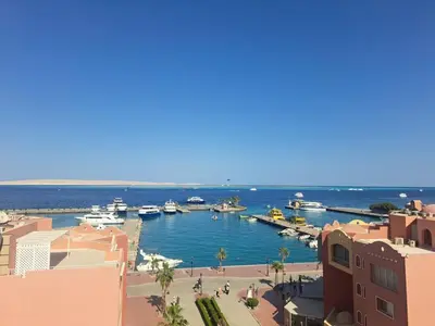 a view of a harbor with boats in the water at Amazing Roof In Marina Hurghada in Hurghada