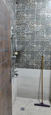a shower in a bathroom with a glass wall at اويسيس مارينا in Hurghada