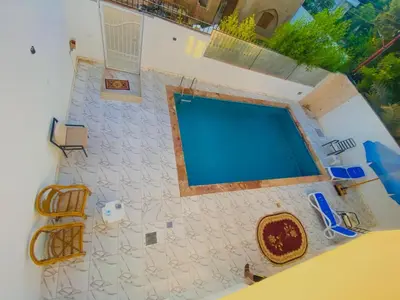 an overhead view of a swimming pool in a house at Taha Guest house in Luxor
