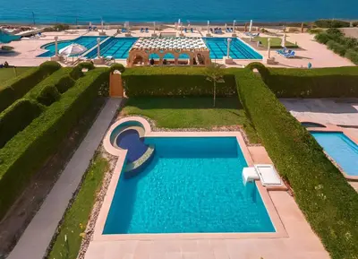 an overhead view of a pool at a resort at Arena Beach Resort - Premium Suites in Hurghada
