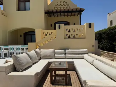 a living room with a couch and a table at NEXT STAY, 3BR Villa, El Gouna in Hurghada