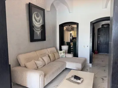 a living room with a couch and a table at NEXT STAY, 3BR Villa, El Gouna in Hurghada