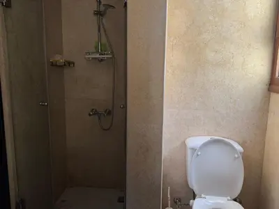 a bathroom with a shower and a toilet in it at NEXT STAY, 3BR Villa, El Gouna in Hurghada