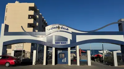 a building with a car parked in front of it at Маленький голубий кит in Hurghada
