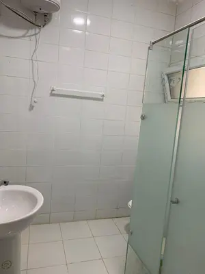 a bathroom with a shower and a sink at Downtown Studio in Hurghada