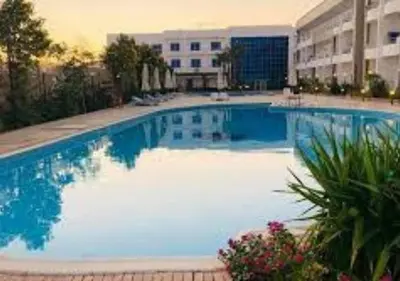 a large blue swimming pool in a hotel at Luxury Cecelia resort in Hurghada