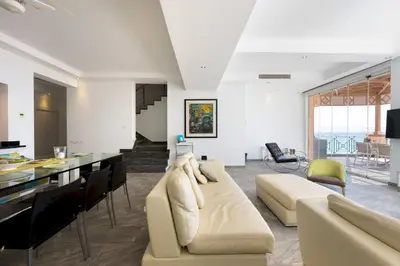 a living room with a couch and a table at VESTA - Soma Bay Residence in Hurghada