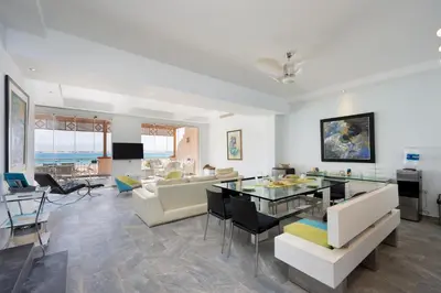 a living room with a couch and a table at VESTA - Soma Bay Residence in Hurghada