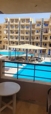 a view of a swimming pool from a building at Gamela in Hurghada