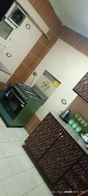 an overhead view of a kitchen with a counter top at شقة كورنيش النيل 3غرف فيو كامل علي النيل in Aswan
