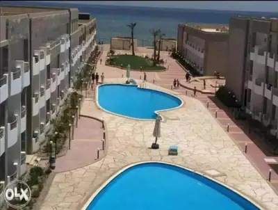 an overhead view of a swimming pool in a building at Cecelia Resort - Studio chalet in Hurghada