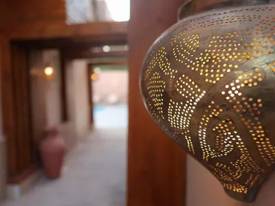 a close up of a vase on a wall at Boutique hotel Neferu Stay in Luxor