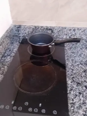a pot sitting on top of a stove at Hurghada Apartment sea view Fiesta 209 in Hurghada