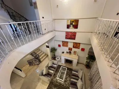an overhead view of a staircase in a house at Mohamed Home in Jazīrat al ‘Awwāmīyah