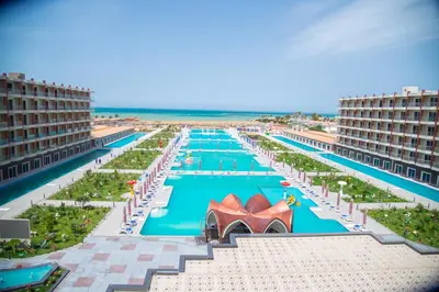 an aerial view of a large swimming pool at a resort at Rewaya Majestic Resort in Hurghada