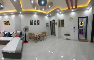 a living room with a couch and a table at Sila in Hurghada
