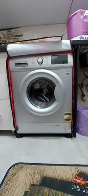 a washing machine sitting in a room at Sila in Hurghada