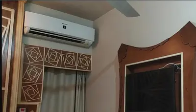 a room with a air conditioner on the wall at El Massa in Idfu