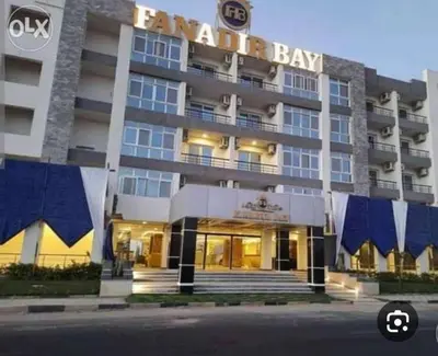 a rendering of the front of the hotel at live in luxury hotel-style apartment in the heart of the city in Hurghada