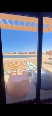 a view of an airport from a window at Luxury villa in Hurghada