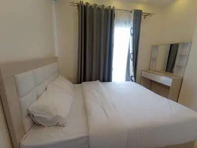 a small bedroom with a white bed and a window at 2 bed Flat, Hurghada, long&short in Hurghada